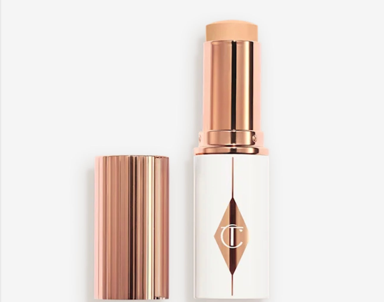 CHARLOTTE TILBURY - 
UNREAL SKIN SHEER GLOW TINT HYDRATING - FONDOTINTA STICK