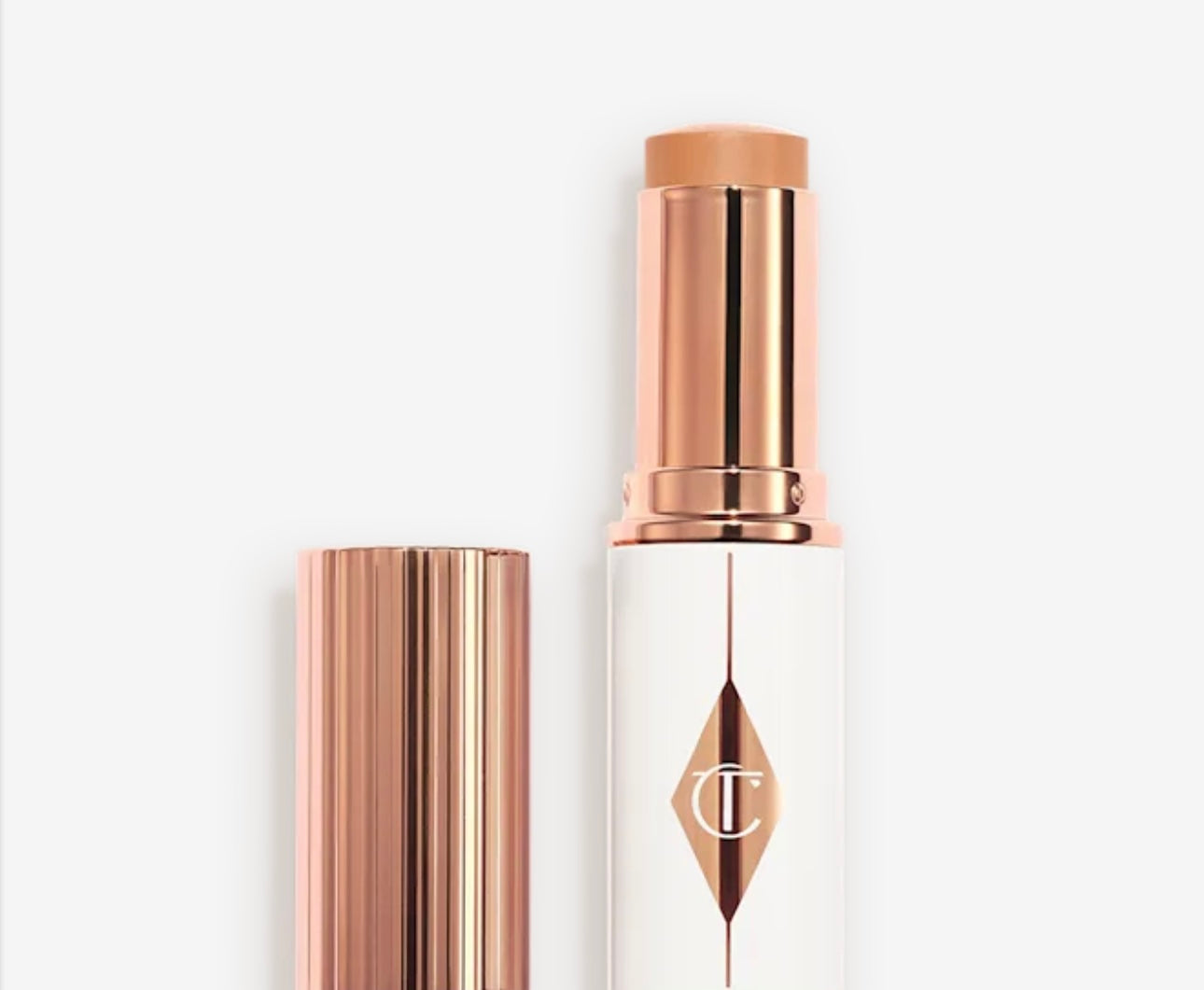 CHARLOTTE TILBURY - 
UNREAL SKIN SHEER GLOW TINT HYDRATING - FONDOTINTA STICK