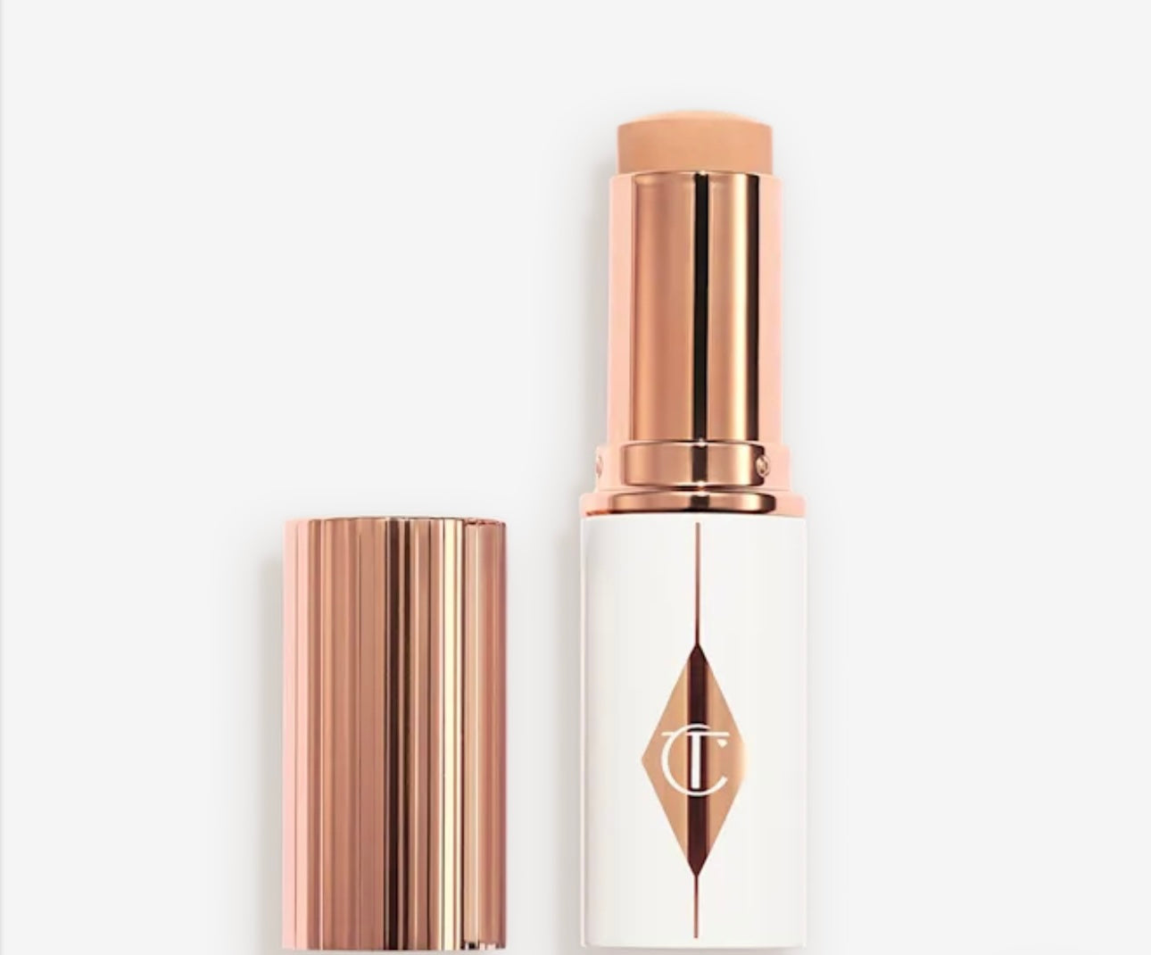 CHARLOTTE TILBURY - 
UNREAL SKIN SHEER GLOW TINT HYDRATING - FONDOTINTA STICK